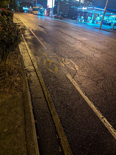 A dangerously narrow bike lane on Gladstone Rd, West End
