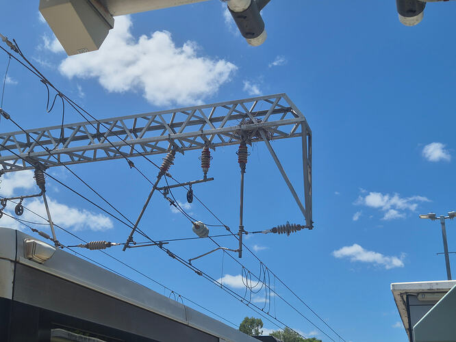 Bird nest in overhead line equipment at Bowen Hills Station (zoomed out)