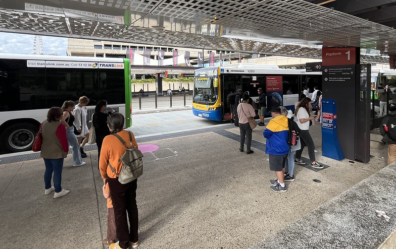Buses and passengers at Cultural Centre